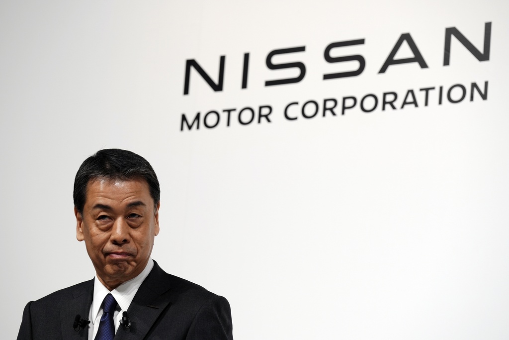 2024年12月23日。日產執行長內田誠出席了在日本東京舉行的與本田和三菱代表的聯合記者會。(AP)
